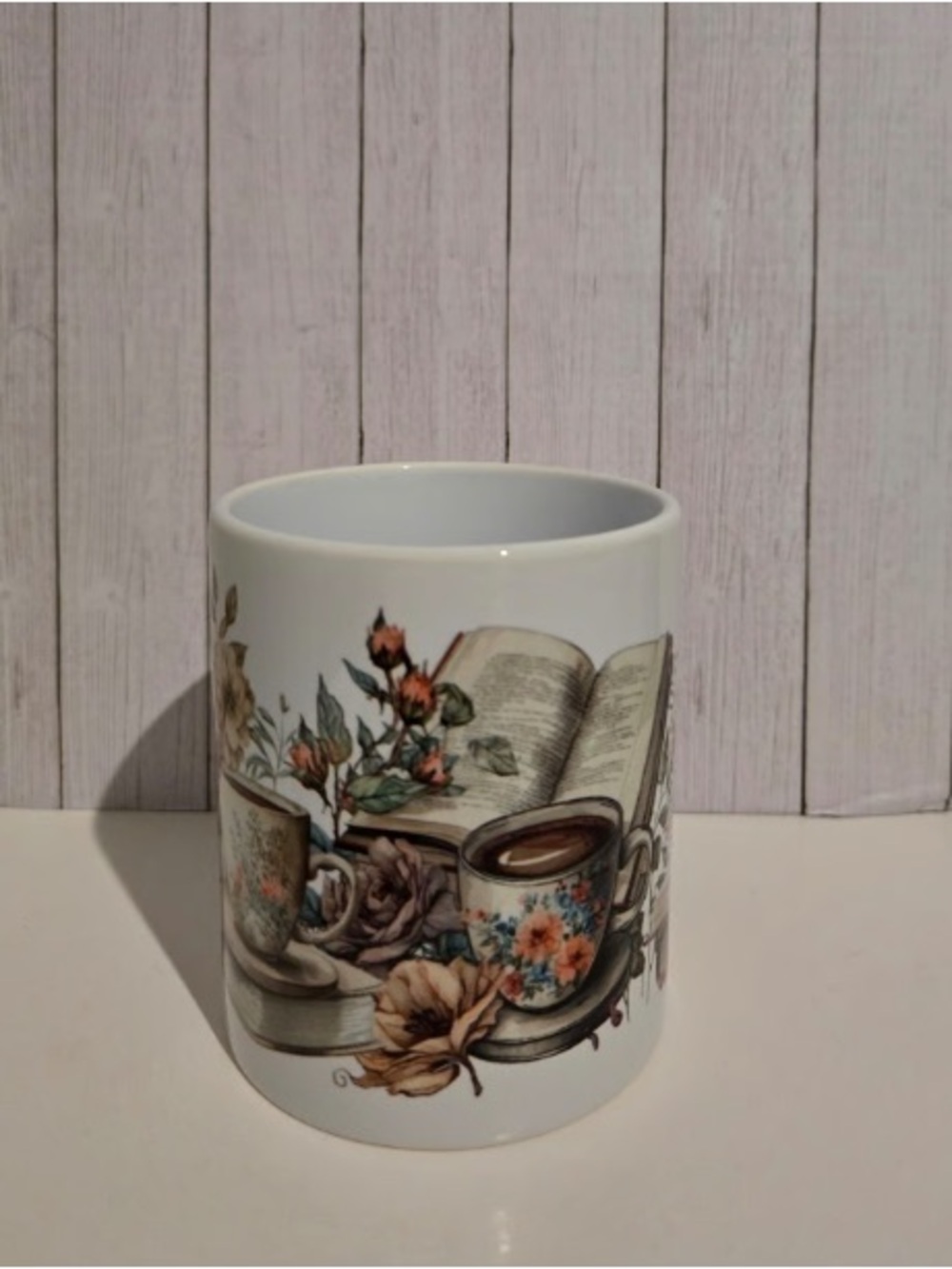 White Ceramic Mug with Floral & Book Illustration